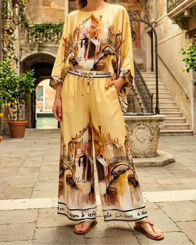 Completo in viscosa stampa Venezia con pantalone palazzo e blusa a pipistrello